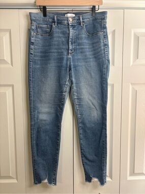 Women’s LOFT high waist Skinny Raw Hem Jeans in a medium wash size 31/12